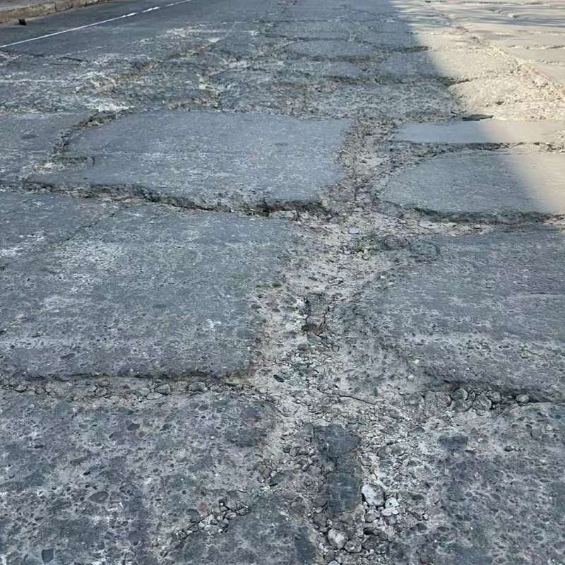 广陵路面起砂露石子修补料